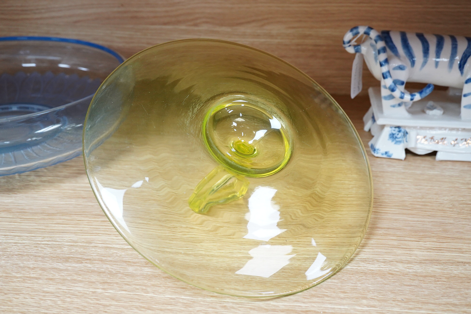 A Muller Art Deco glass dish, together with a uranium glass cake stand, largest 32cm in diameter